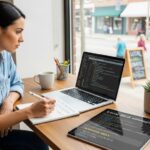 Local business owner implementing schema markup on website to improve local SEO rankings and search visibility