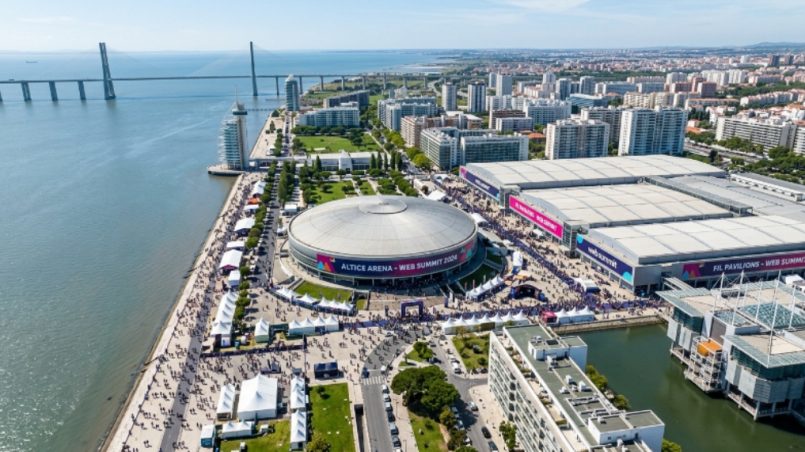 Aerial view of Parque das Nações district in Lisbon with MEO Arena and FIL exhibition centre visible along the waterfront during Web Summit week